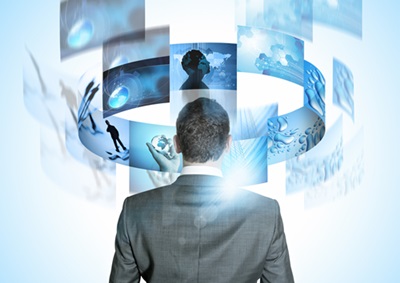 businessman screens images circling above head