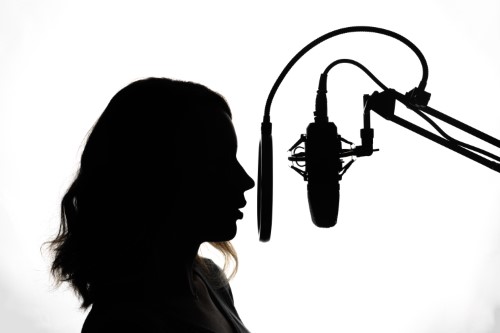 use professional voice talent woman microphone silhouette