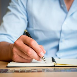 Man taking notes