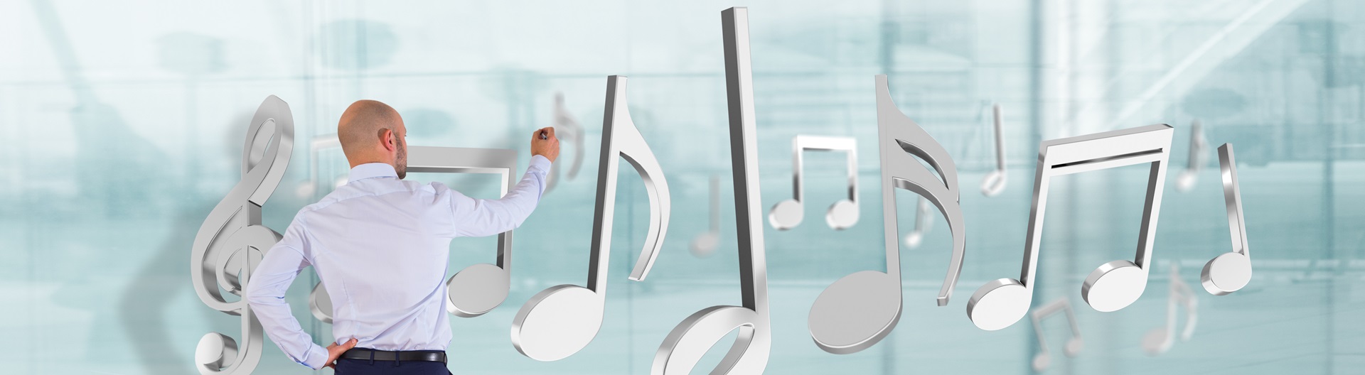 man drawing music notes wall crop